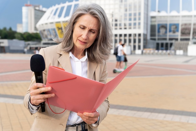 A reporter drafting a newsletter issue
